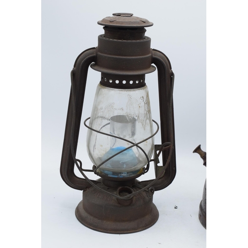 241 - An original Bialaddin paraffin lamp together with a similar smaller example (2). Tallest 34cm tall.