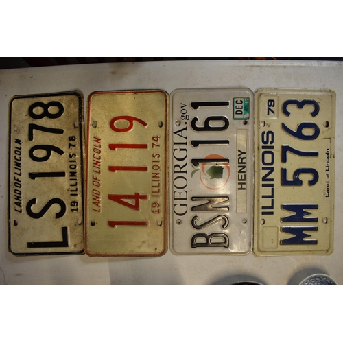 264 - A collection of vintage American car number plates (4)