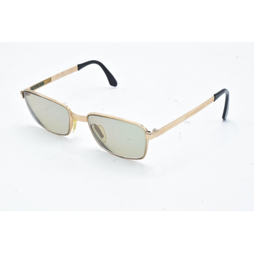 265 - A pair of Viennaline gold plated vintage sunglasses fitted with prescription lenses in case.