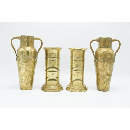 266 - A collection of metalware to include a pair of Art Nouveau style vases by Tamco, a pair of trench ar... 