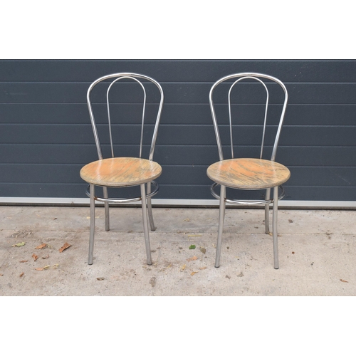 283 - A pair of retro / vintage aluminium American Diner style chairs (87cm tall) together with a Lloyd Lo... 