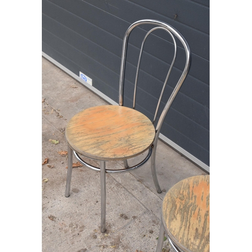 283 - A pair of retro / vintage aluminium American Diner style chairs (87cm tall) together with a Lloyd Lo... 