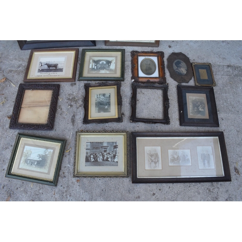 284 - A good collection of 19th and 20th century photo frames with subjects to include carved wooden examp... 