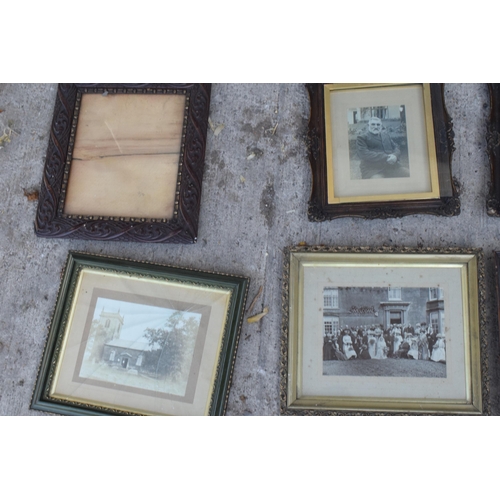 284 - A good collection of 19th and 20th century photo frames with subjects to include carved wooden examp... 