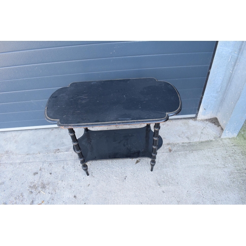 286 - An early 20th century ebonised side table with brass beading. 92 x 48 x 70cm. In good functional con... 