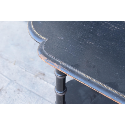 286 - An early 20th century ebonised side table with brass beading. 92 x 48 x 70cm. In good functional con... 