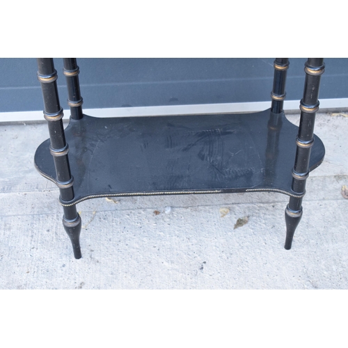 286 - An early 20th century ebonised side table with brass beading. 92 x 48 x 70cm. In good functional con... 