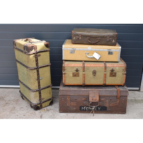 293 - A good collection of vintage trunks and suit cases to include leather and similar examples. Largest ... 