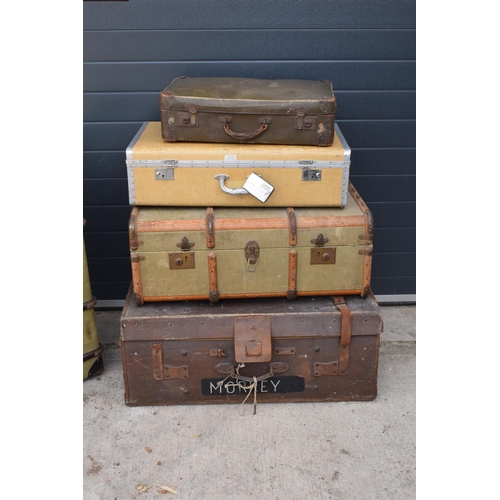 293 - A good collection of vintage trunks and suit cases to include leather and similar examples. Largest ... 