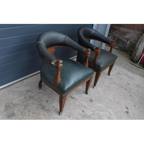 299 - A pair of 19th century upholstered Captain's Bow or similar smokers / library chairs. In good struct... 