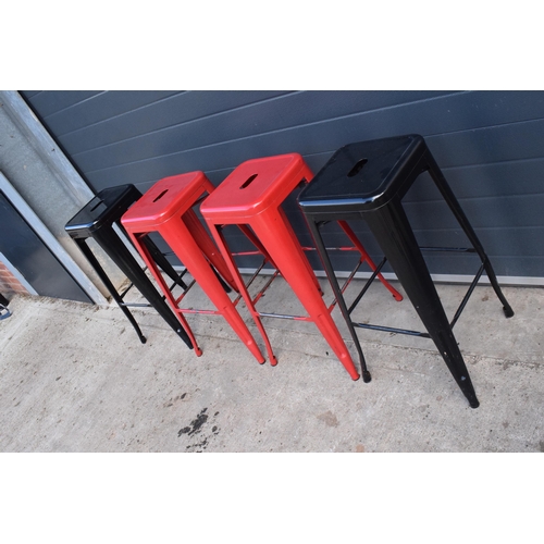 307 - A collection of industrial style metal stacking stools (4). 76cm tall. In good functional condition ... 