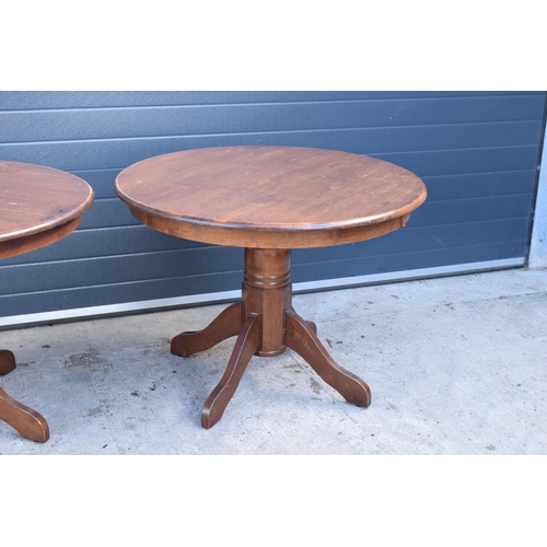 310 - A collection of large late 20th century wooden circular table, ideal for a pub / restaurant. 105cm d... 