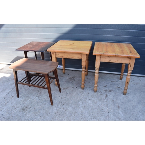 312 - A collection of tables to include 2 square pine pub / kitchen tables, a similar darker example and a... 