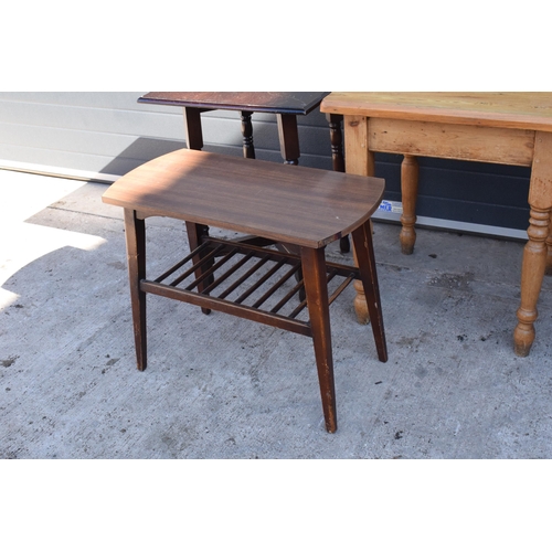 312 - A collection of tables to include 2 square pine pub / kitchen tables, a similar darker example and a... 