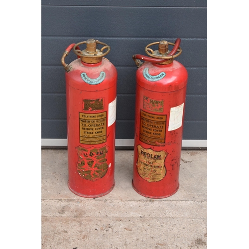 314 - A pair of 1970s Redlam Fire Extinguishers (2) (with some contents). 60cm tall. NO POSTAGE