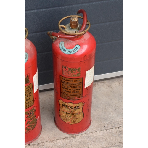 314 - A pair of 1970s Redlam Fire Extinguishers (2) (with some contents). 60cm tall. NO POSTAGE