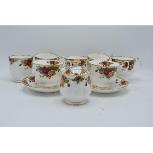 56 - A collection of Royal Albert Old Country Roses items to include 2 breakfast cups and saucers, 5 mugs... 