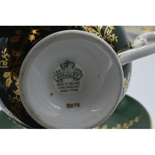 59 - A collection of cups and saucers / duos to include Aysnley and Paragon depicting regal style scenes ... 