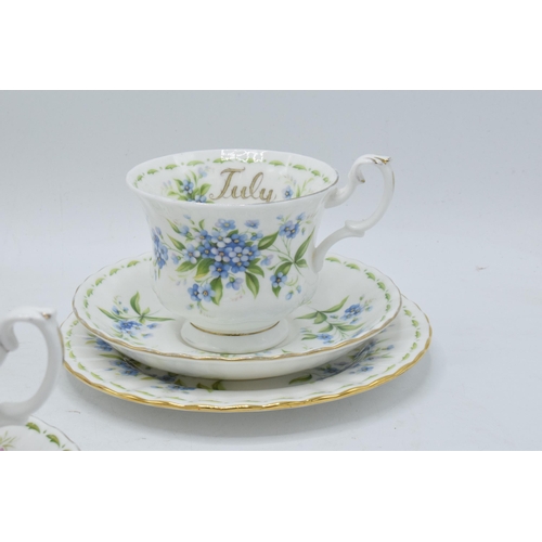 60 - A collection of Royal Albert Flower of the Month trios to include September - Michaelmas Daisy, July... 