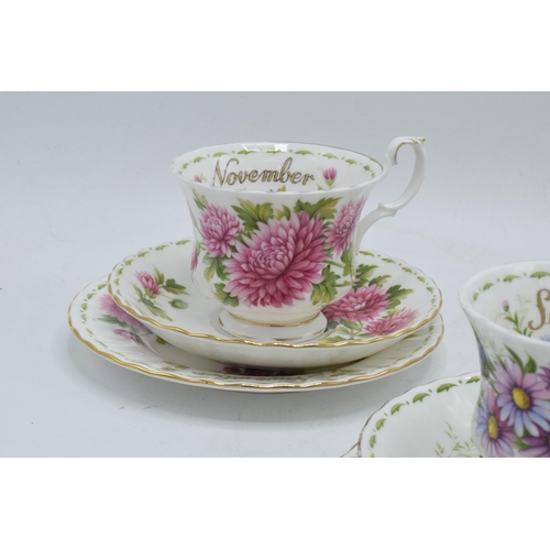 60 - A collection of Royal Albert Flower of the Month trios to include September - Michaelmas Daisy, July... 