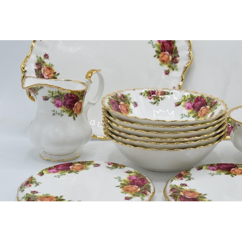 64 - A collection of Royal Albert Old Country Roses items to include 2 cake plates, 2 teapot stands, 6 bo... 