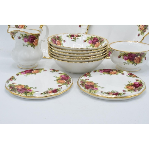 64 - A collection of Royal Albert Old Country Roses items to include 2 cake plates, 2 teapot stands, 6 bo... 