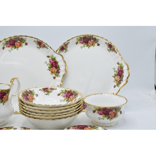 64 - A collection of Royal Albert Old Country Roses items to include 2 cake plates, 2 teapot stands, 6 bo... 