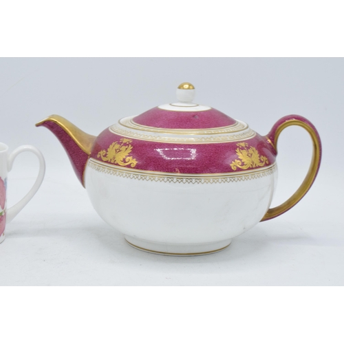 69 - A pair of Wedgwood items to include a Columbia teapot and a milk jug in the Meadow Sweet design (2).... 