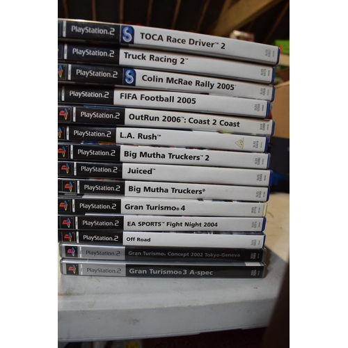 7 - A collection of gaming interest items to include a Playstation 1, a Playstation 2 Thin, controllers,... 
