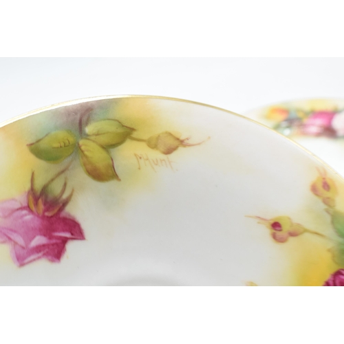 82 - A collection of Royal Worcester items to include a saucer (1936) and side plate (1938) decorated wit... 