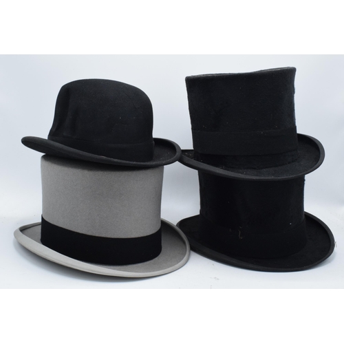 207 - A collection of top hats to include Hyam and Co of Birmingham, a Rowans example (grey with carry cas... 