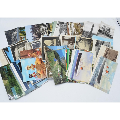 214 - A mixed collection of mainly 20th century postcards to include Russian interest, British scenes and ... 