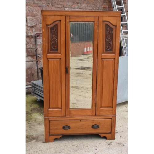 317 - An Edwardian satinwood wardrobe with central mirror. 107 x 43 x 187cm tall. In good condition with s... 