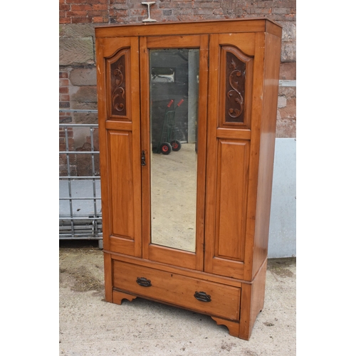 317 - An Edwardian satinwood wardrobe with central mirror. 107 x 43 x 187cm tall. In good condition with s... 