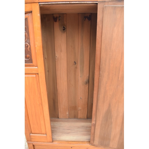 317 - An Edwardian satinwood wardrobe with central mirror. 107 x 43 x 187cm tall. In good condition with s... 