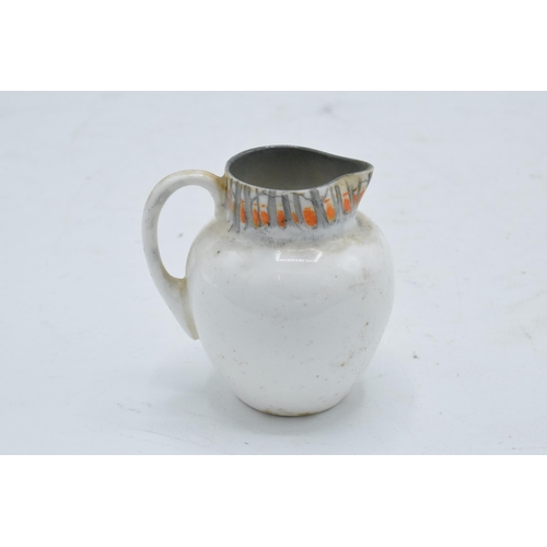 128 - Royal Doulton miniature seriesware jug depicting sheep in a wintery scene. 6cm tall. In good conditi... 