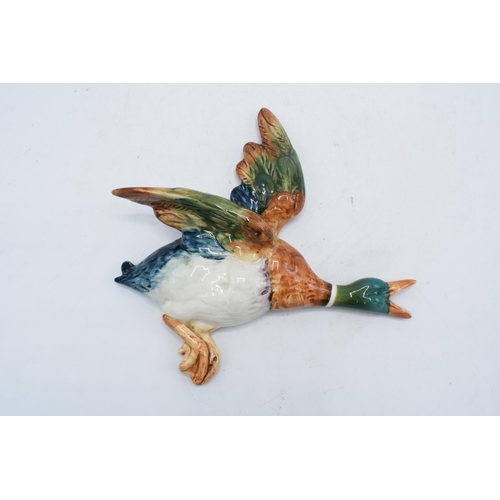 150 - Beswick flying mallard wall plaque 596-2. In good condition with no obvious damage or restoration.