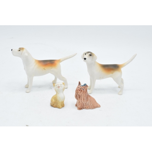 166 - A collection of Beswick to include matte fox hounds 2262 and 2263 together with Yorkshire Terrier La... 