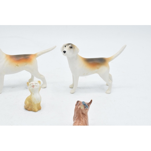 166 - A collection of Beswick to include matte fox hounds 2262 and 2263 together with Yorkshire Terrier La... 