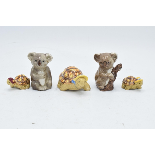 169 - A collection of Beswick to include Koala bear on branch 1039 and baby koala 1040 together with famil... 