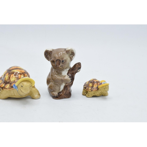 169 - A collection of Beswick to include Koala bear on branch 1039 and baby koala 1040 together with famil... 