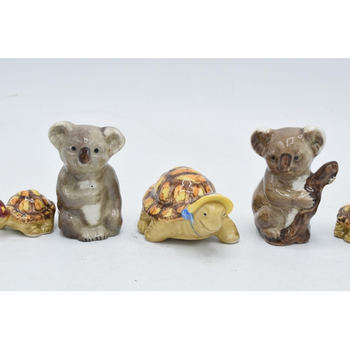 169 - A collection of Beswick to include Koala bear on branch 1039 and baby koala 1040 together with famil... 