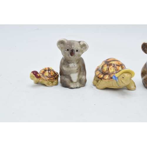 169 - A collection of Beswick to include Koala bear on branch 1039 and baby koala 1040 together with famil... 