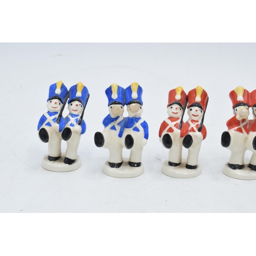 171 - A collection of Beswick Toy Soldier musicians to include models 1626, 1627 and 1628 (6) in red and b... 