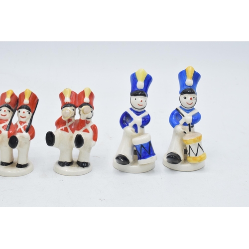 171 - A collection of Beswick Toy Soldier musicians to include models 1626, 1627 and 1628 (6) in red and b... 