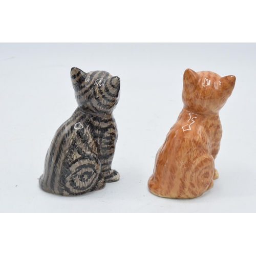 176 - A pair of Beswick Persian Kittens 1886 to include a grey swiss roll example together with a ginger s... 