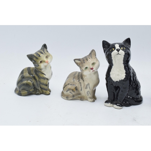 177 - A collection of Beswick cats and kittens to include 1436 x 3 to include matte black example (one wit... 