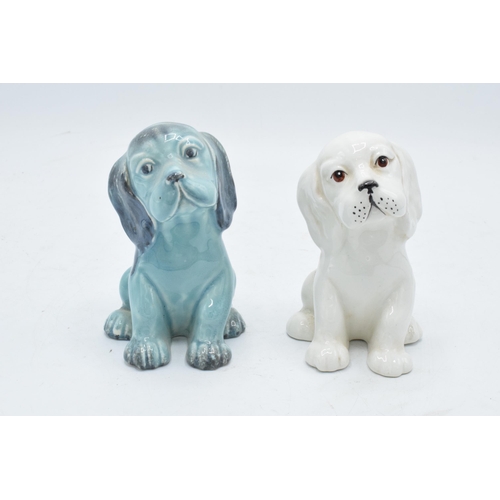 182 - Beswick Lollopy Seated Puppy 454 in blue colourway and a white colourway (2). In good condition with... 