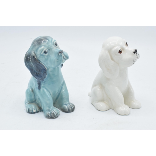 182 - Beswick Lollopy Seated Puppy 454 in blue colourway and a white colourway (2). In good condition with... 