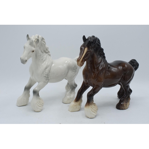 183 - Beswick Cantering Shires 975 to include a brown and a grey example (2). In good condition with no ob... 